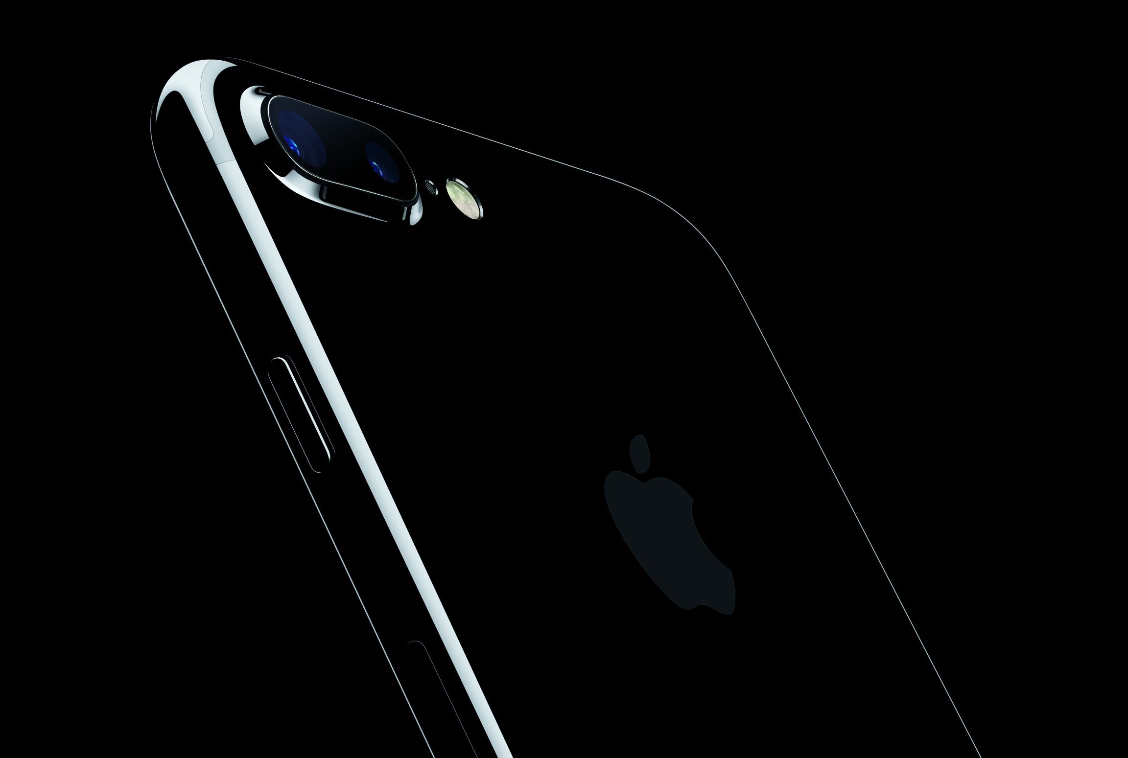 Jet black iPhone 7 dramatically lit on a pure black background